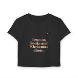 I Run on Books and Christmas Cheer Women's Baby Tee | Fitted Holiday T-Shirt for Book Lovers | Festive and Stylish Gift | Sizes for Every Reader