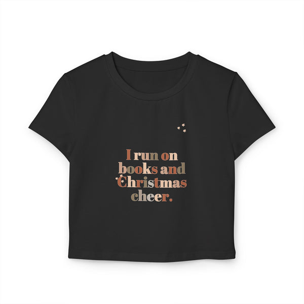 I Run on Books and Christmas Cheer Women's Baby Tee | Fitted Holiday T-Shirt for Book Lovers | Festive and Stylish Gift | Sizes for Every Reader